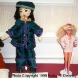 CC17-DC-05-06: 5. [Chinese Cloth] Doll (left) - Self Made. 6. Yuppie Biker Barbie (right) - Purchased